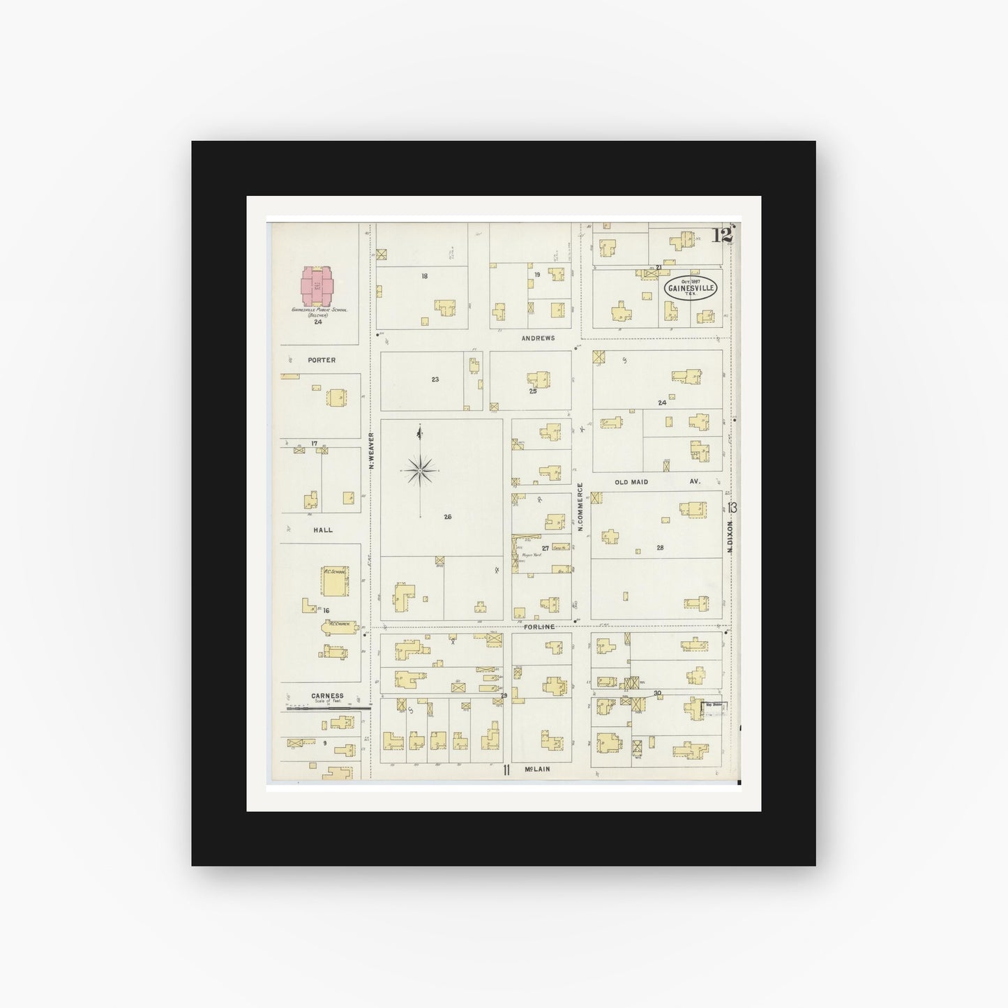 Old map wall art mockup — black gallery frame with white mat — Sanborn Fire Insurance Map from Gainesville, Cooke County, Texas (1897), Sheet #0012