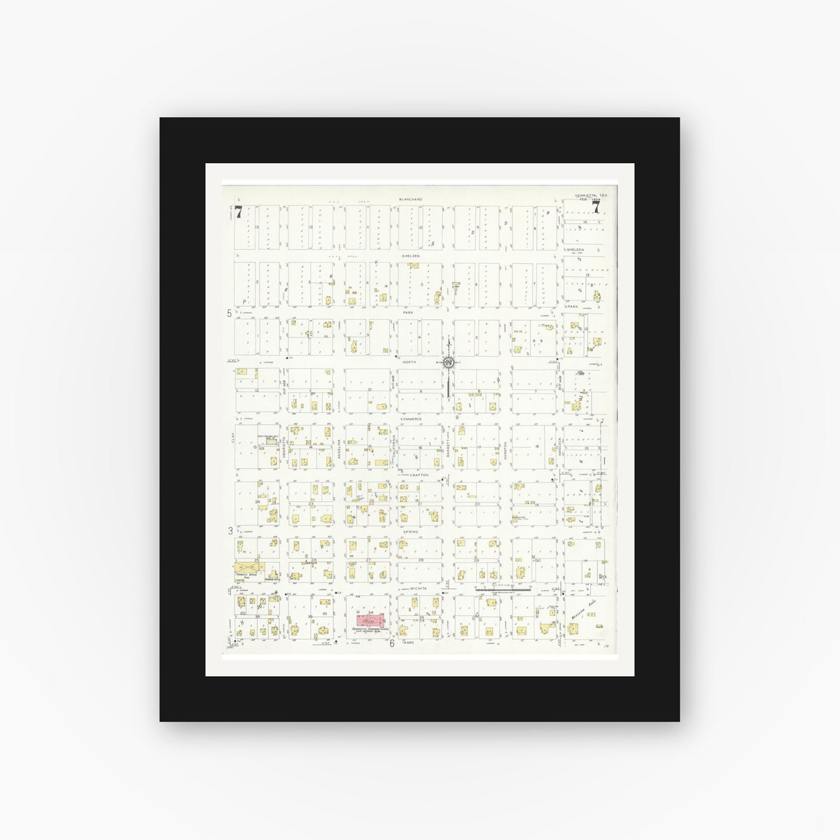 Old map wall art mockup — black gallery frame with white mat — Sanborn Fire Insurance Map from Henrietta, Clay County, Texas (1934), Sheet #0007
