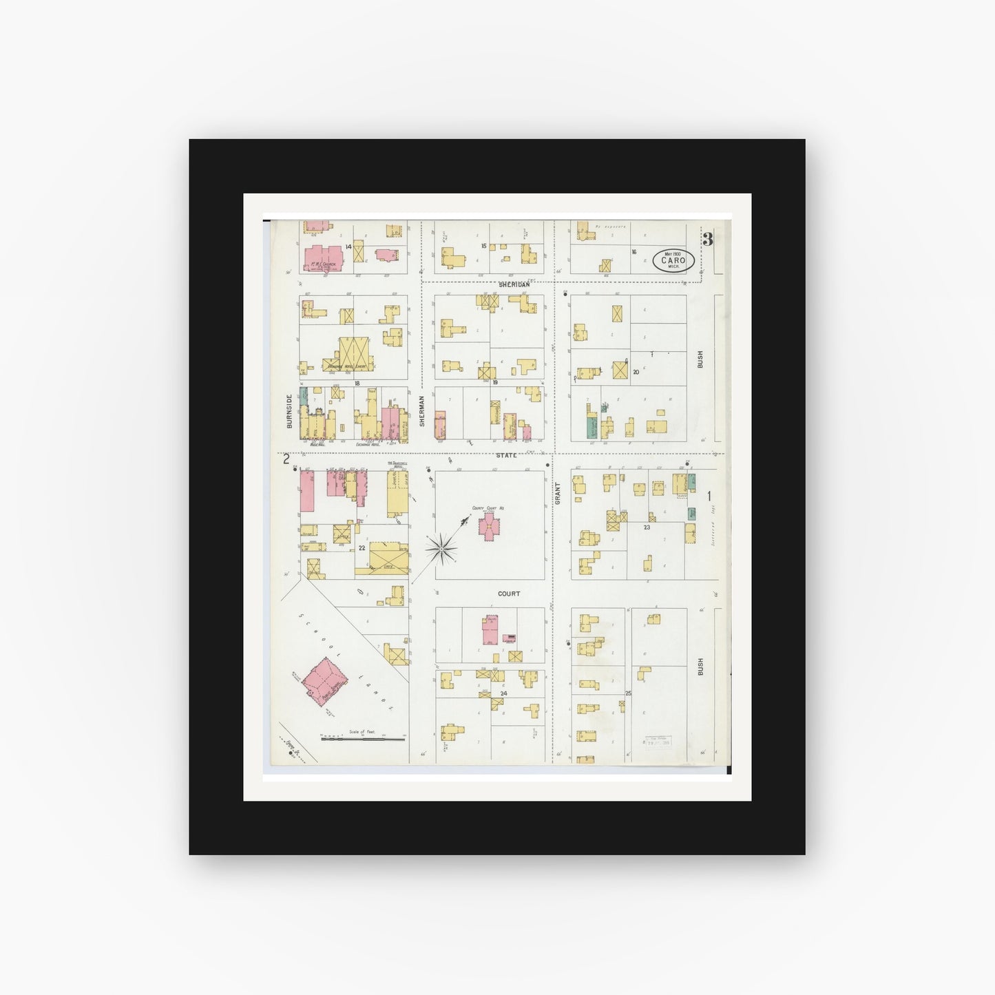 Old map wall art mockup — black gallery frame with white mat — Sanborn Fire Insurance Map from Caro, Tuscola County, Michigan (1900), Sheet #0003