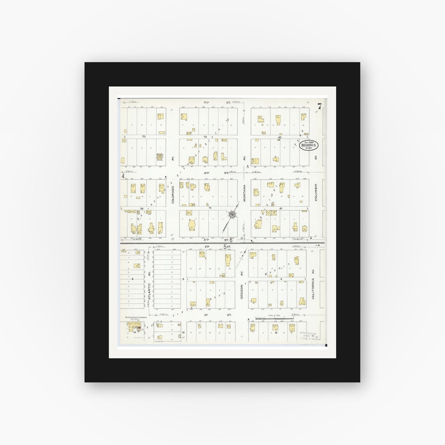 Old map wall art mockup — black gallery frame with white mat — Sanborn Fire Insurance Map from Morris, Stevens County, Minnesota (1909), Sheet #0007