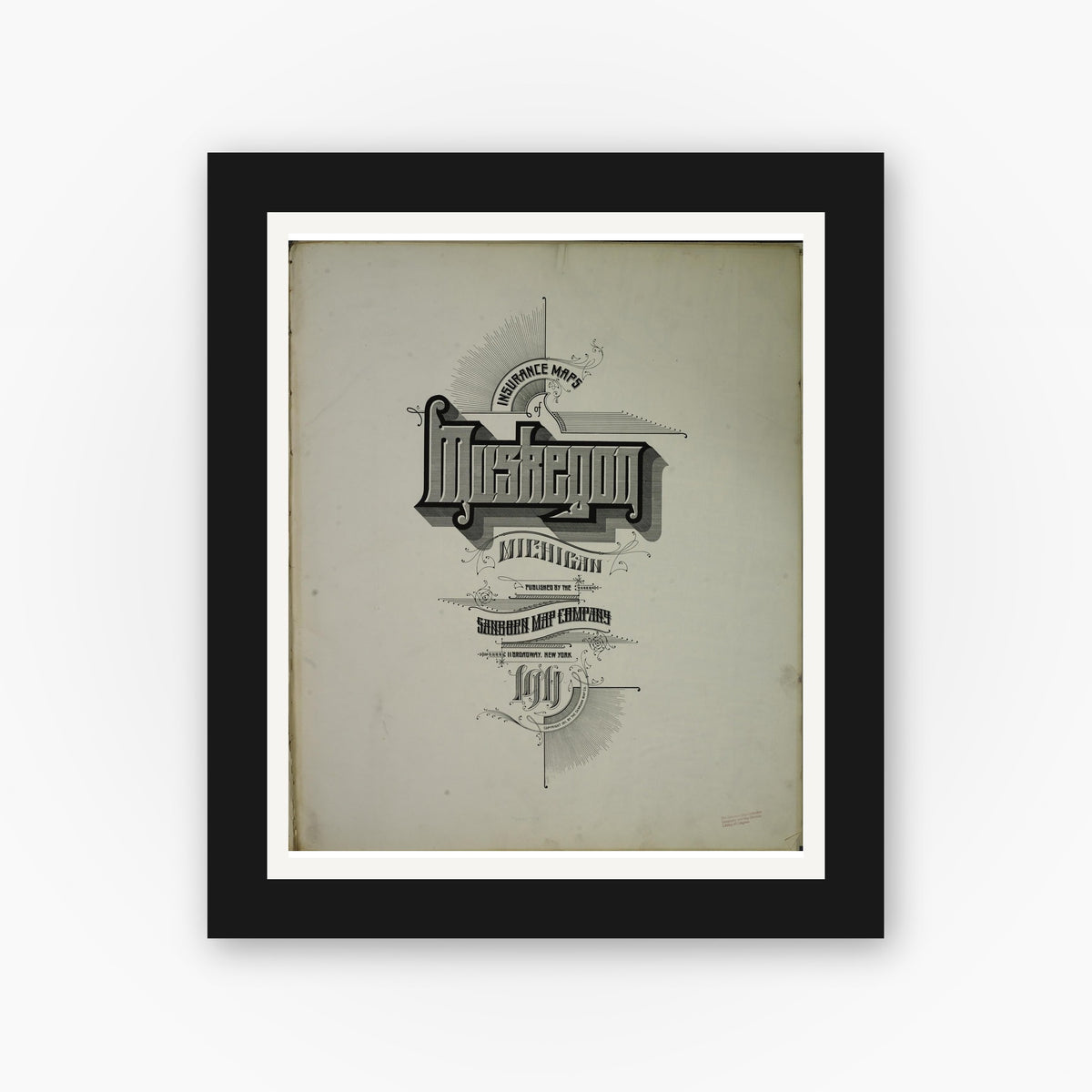 Old map wall art mockup — black gallery frame with white mat — Sanborn Fire Insurance Map from Muskegon, Muskegon County, Michigan (1911), Sheet #0001