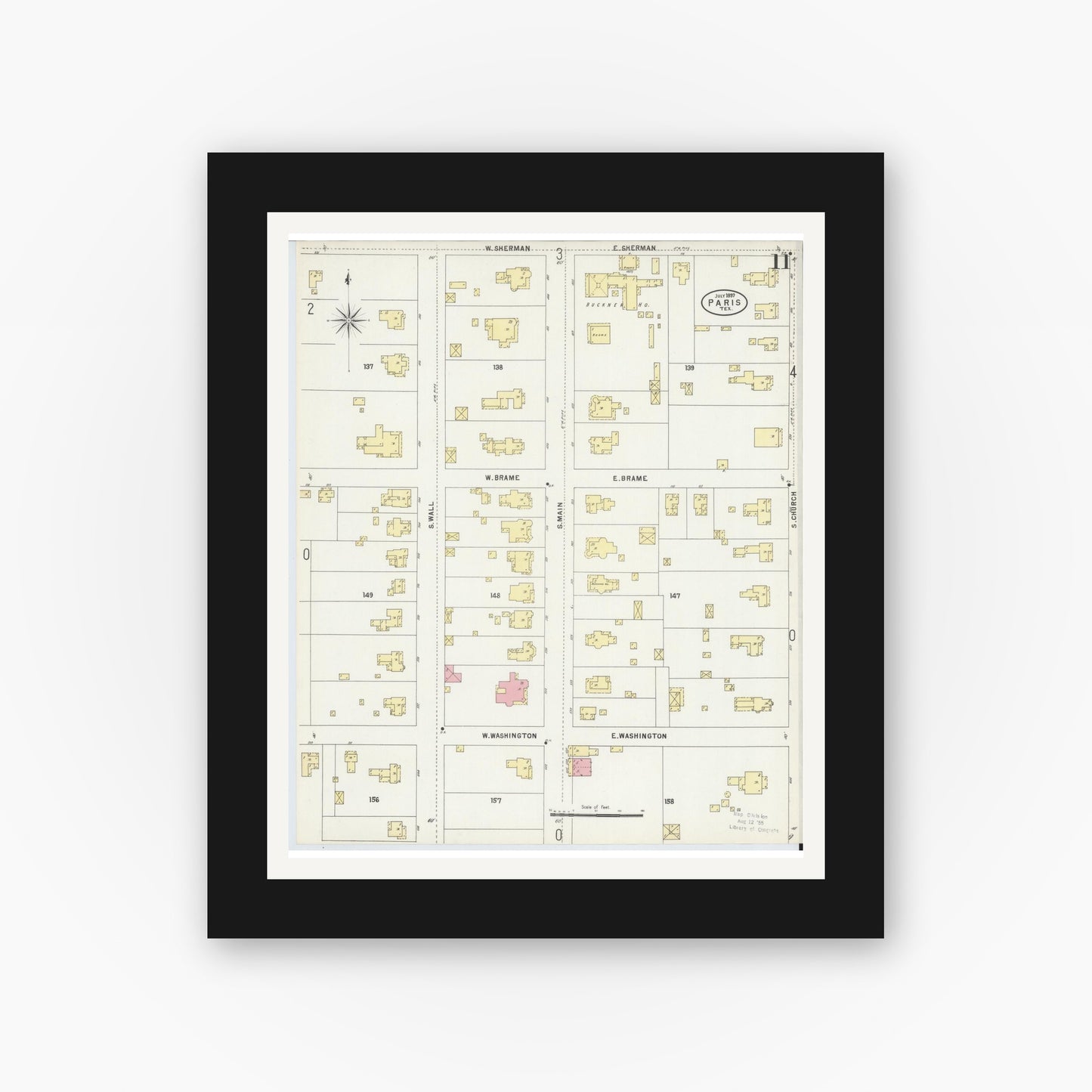 Old map wall art mockup — black gallery frame with white mat — Sanborn Fire Insurance Map from Paris, Lamar County, Texas (1897), Sheet #0011