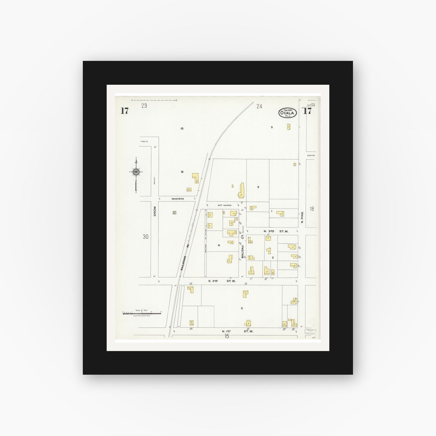 Old map wall art mockup — black gallery frame with white mat — Sanborn Fire Insurance Map from Ocala, Marion County, Florida (1924), Sheet #0017