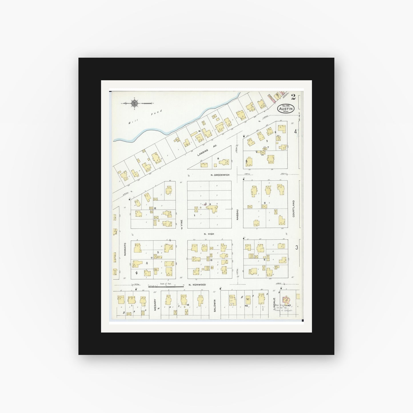 Old map wall art mockup — black gallery frame with white mat — Sanborn Fire Insurance Map from Austin, Mower County, Minnesota (1910), Sheet #0002