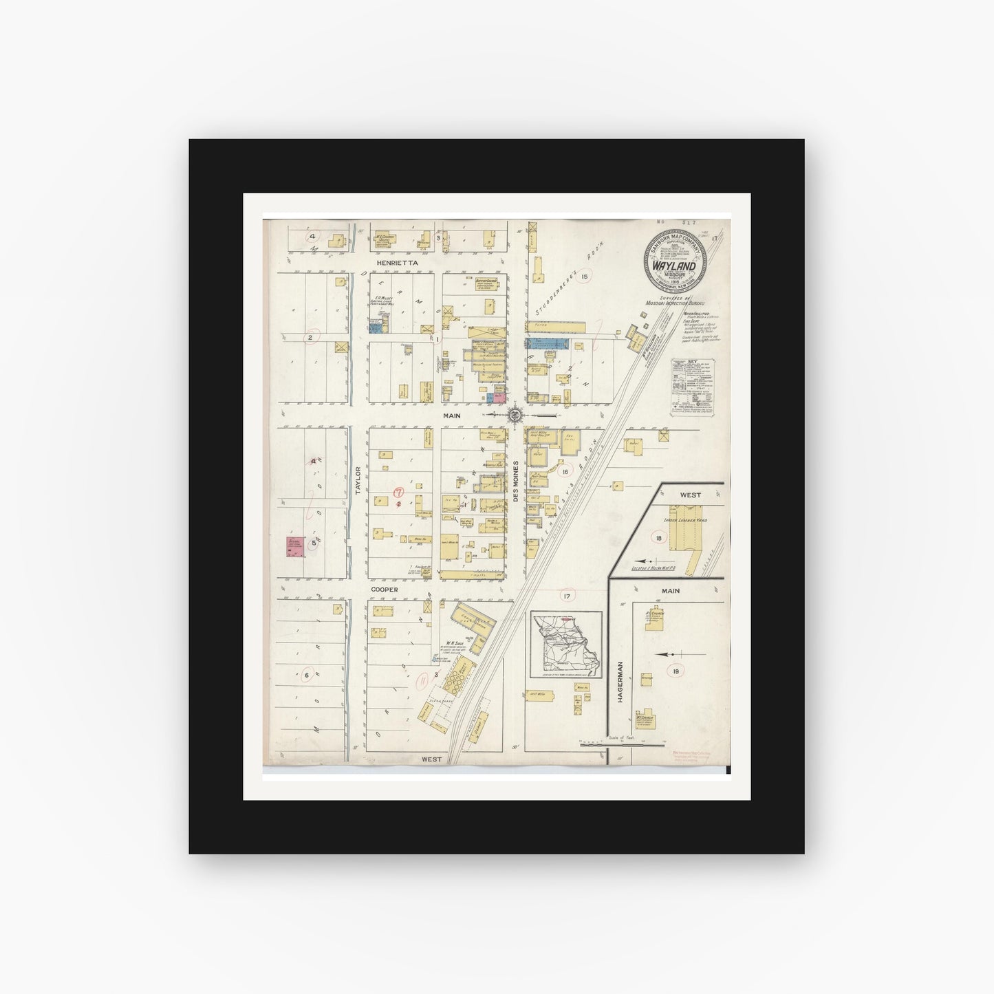 Old map wall art mockup — black gallery frame with white mat — Sanborn Fire Insurance Map from Wayland, Clark County, Missouri (1916), Sheet #0001