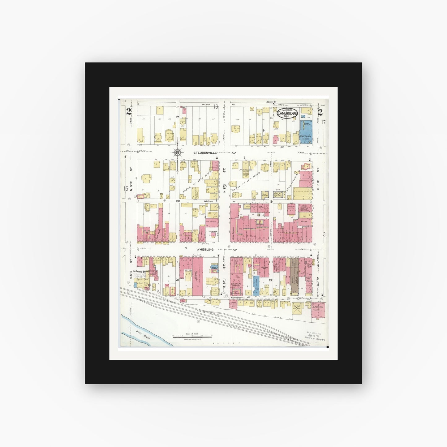 Old map wall art mockup — black gallery frame with white mat — Sanborn Fire Insurance Map from Cambridge, Guernsey County, Ohio (1923), Sheet #0002