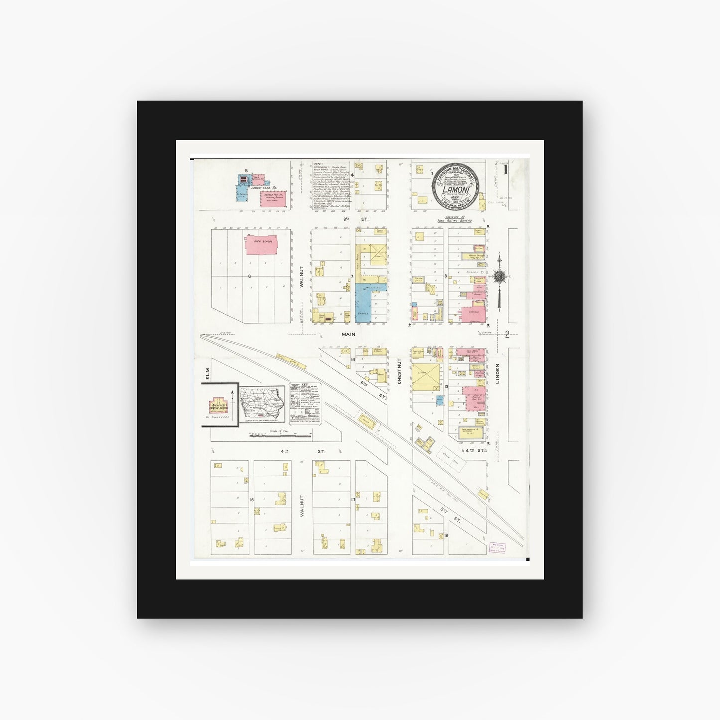 Old map wall art mockup — black gallery frame with white mat — Sanborn Fire Insurance Map from Lamoni, Decatur County, Iowa (1916) — Complete Set