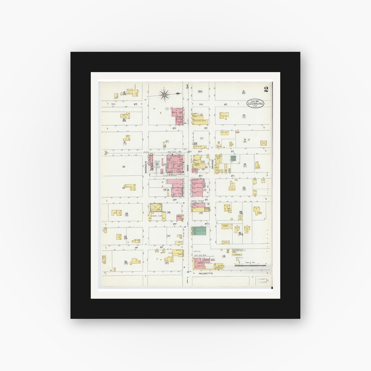Old map wall art mockup — black gallery frame with white mat — Sanborn Fire Insurance Map from Leesburg, Lake County, Florida (1906), Sheet #0002