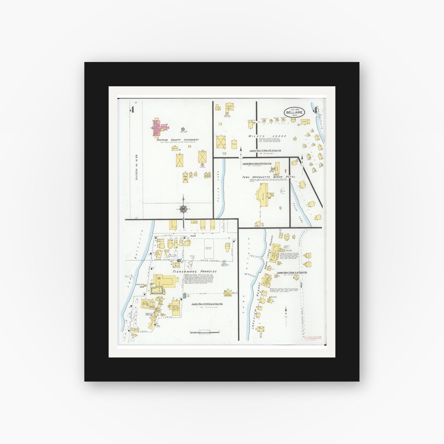 Old map wall art mockup — black gallery frame with white mat — Sanborn Fire Insurance Map from Bellaire, Antrim County, Michigan (1929), Sheet #0004