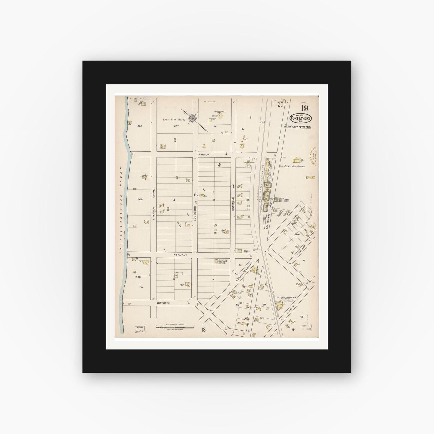 Old map wall art mockup — black gallery frame with white mat — Sanborn Fire Insurance Map from Fort Myers, Lee County, Florida (1922), Sheet #0019