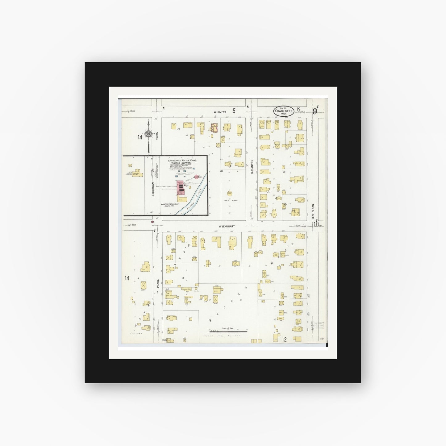 Old map wall art mockup — black gallery frame with white mat — Sanborn Fire Insurance Map from Charlotte, Eaton County, Michigan (1911), Sheet #0009