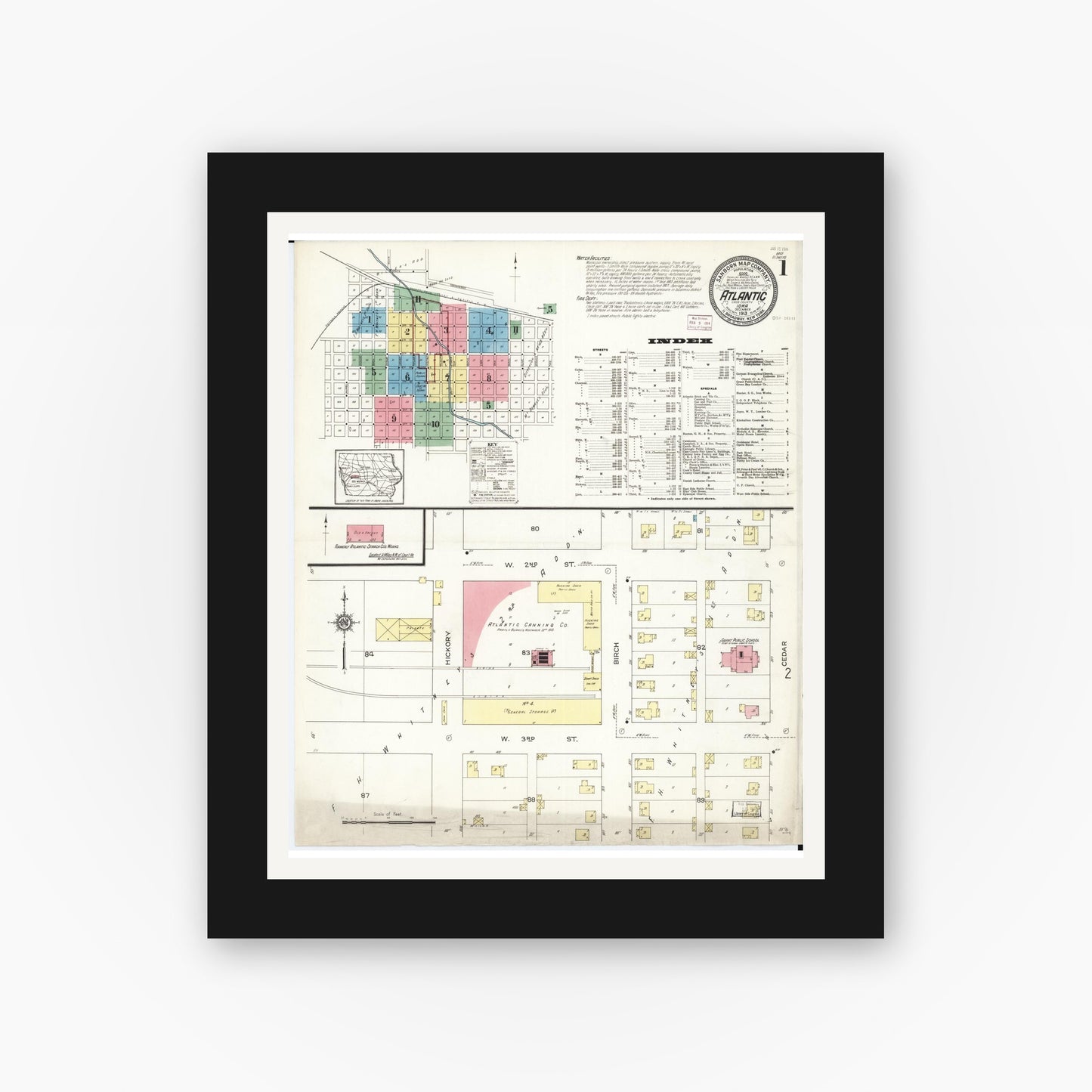 Old map wall art mockup — black gallery frame with white mat — Sanborn Fire Insurance Map from Atlantic, Cass County, Iowa (1913) — Complete Set