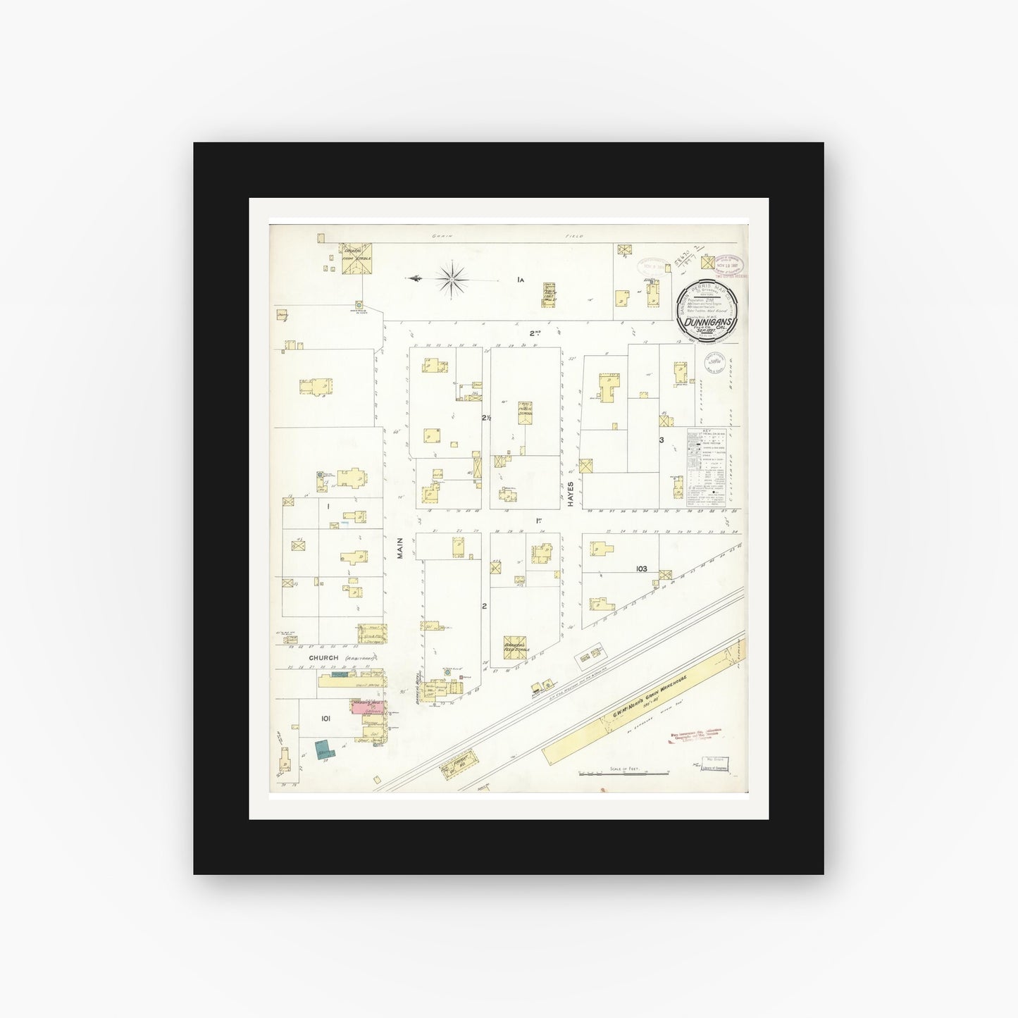 Old map wall art mockup — black gallery frame with white mat — Sanborn Fire Insurance Map from Dunnigan, Yolo County, California (1897), Sheet #0001