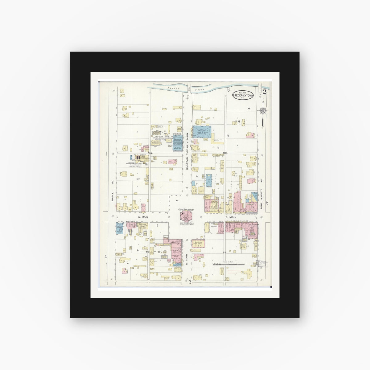 Old map wall art mockup — black gallery frame with white mat — Sanborn Fire Insurance Map from Fredericktown, Madison County, Missouri (1914), Sheet #0002