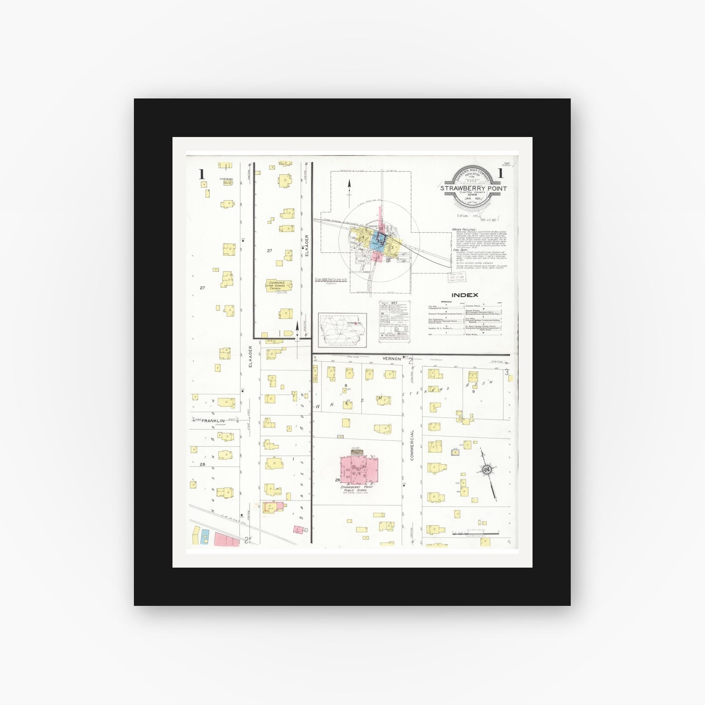 Old map wall art mockup — black gallery frame with white mat — Sanborn Fire Insurance Map from Strawberry Point, Clayton County, Iowa (1931), Sheet #0001