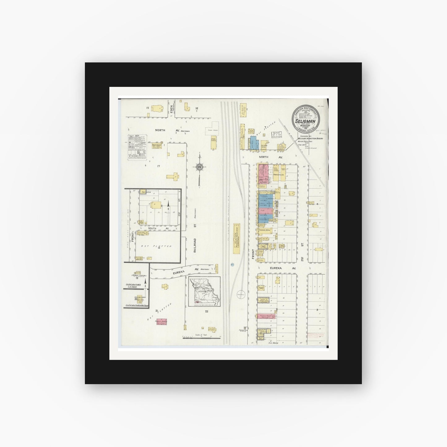 Old map wall art mockup — black gallery frame with white mat — Sanborn Fire Insurance Map from Seligman, Barry County, Missouri (1916), Sheet #0001
