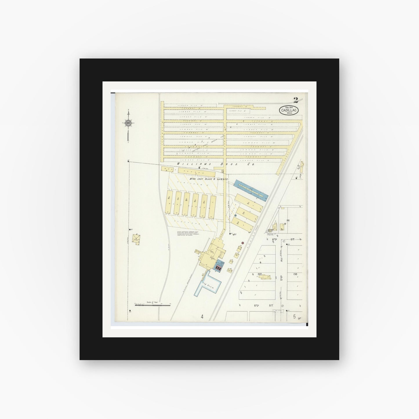 Old map wall art mockup — black gallery frame with white mat — Sanborn Fire Insurance Map from Cadillac, Wexford County, Michigan (1914), Sheet #0002