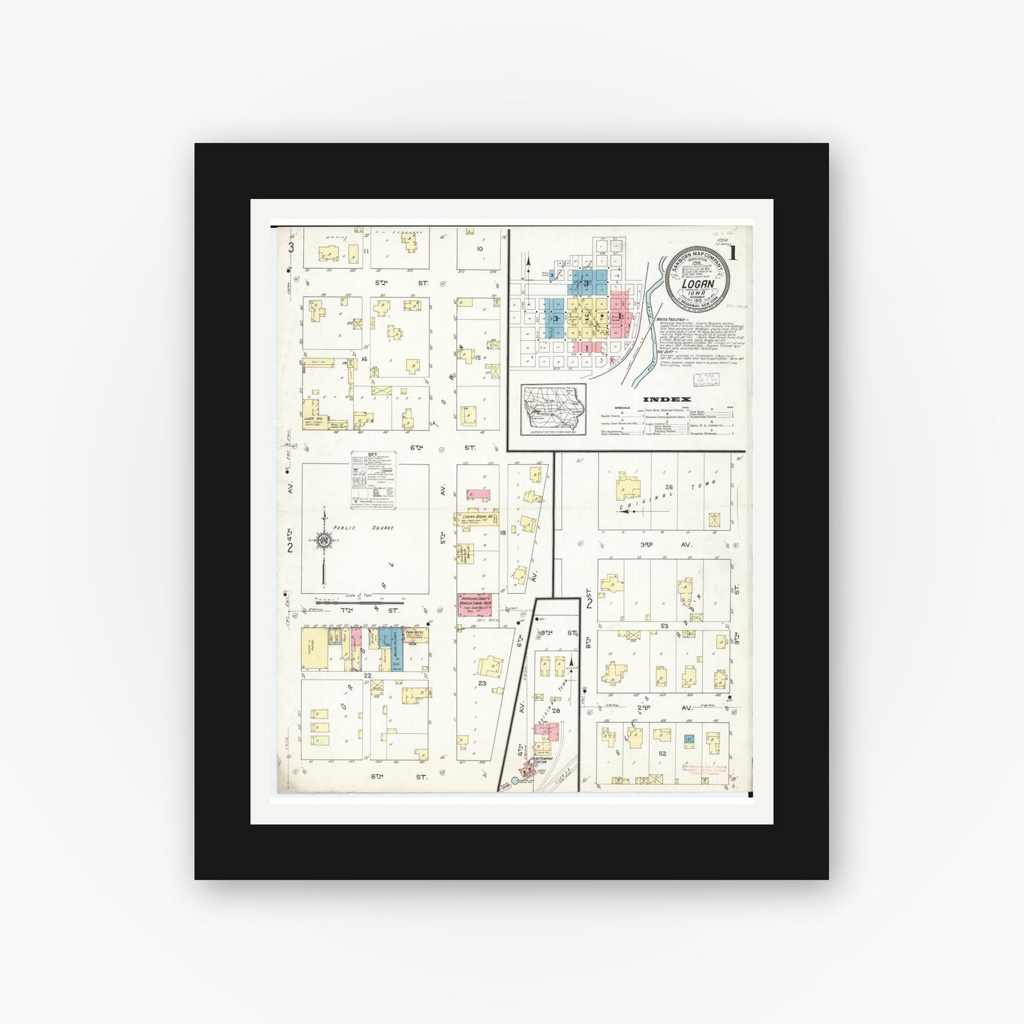 Old map wall art mockup — black gallery frame with white mat — Sanborn Fire Insurance Map from Logan, Harrison County, Iowa (1913) — Complete Set