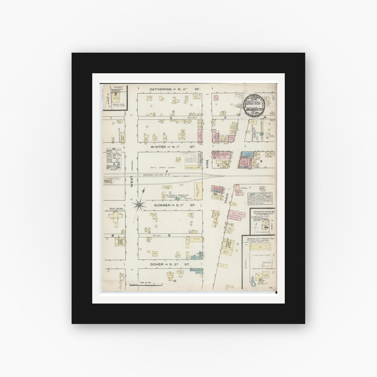Old map wall art mockup — black gallery frame with white mat — Sanborn Fire Insurance Map from Monroe City, Monroe County, Missouri (1884), Sheet #0001