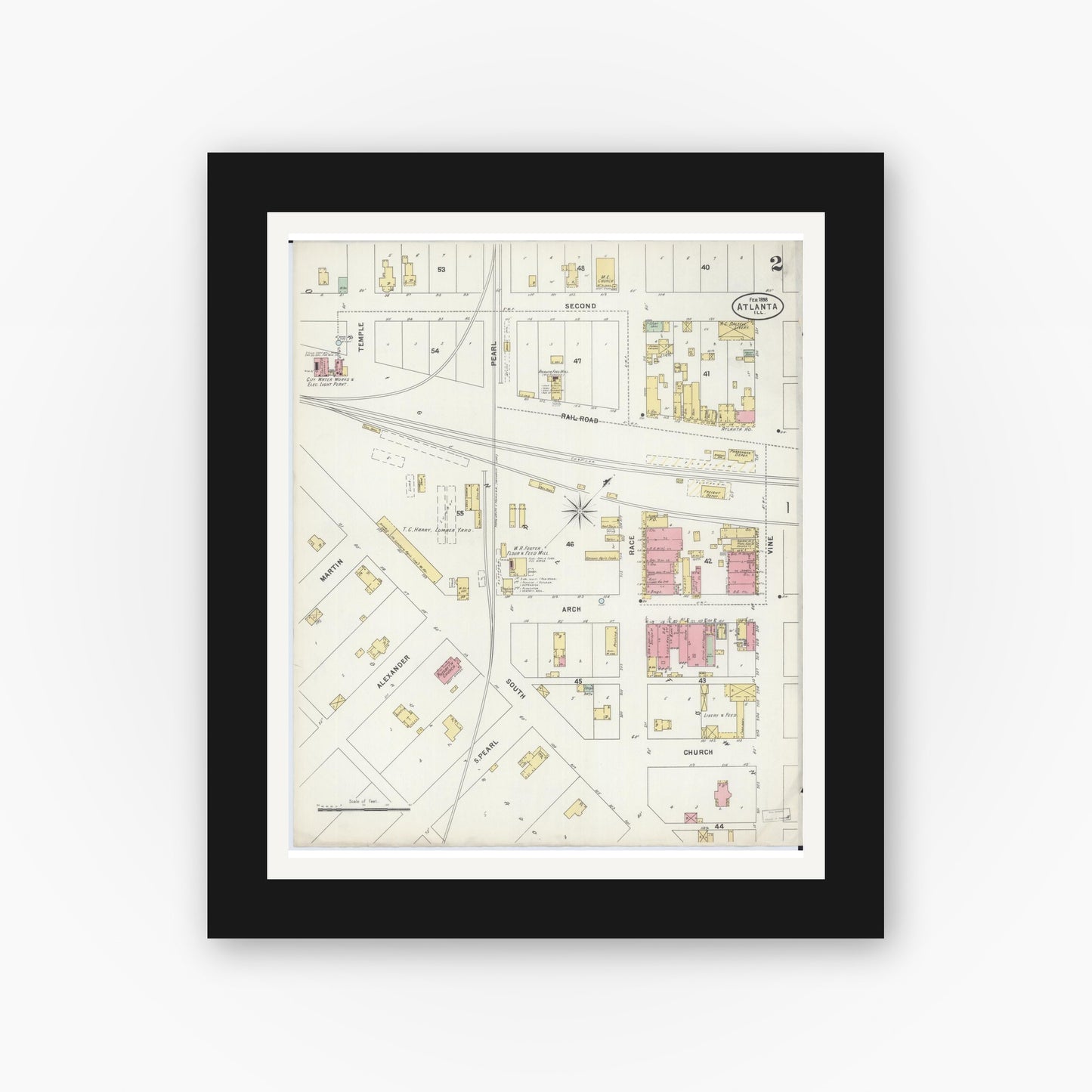 Old map wall art mockup — black gallery frame with white mat — Sanborn Fire Insurance Map from Atlanta, Logan County, Illinois (1898), Sheet #0002