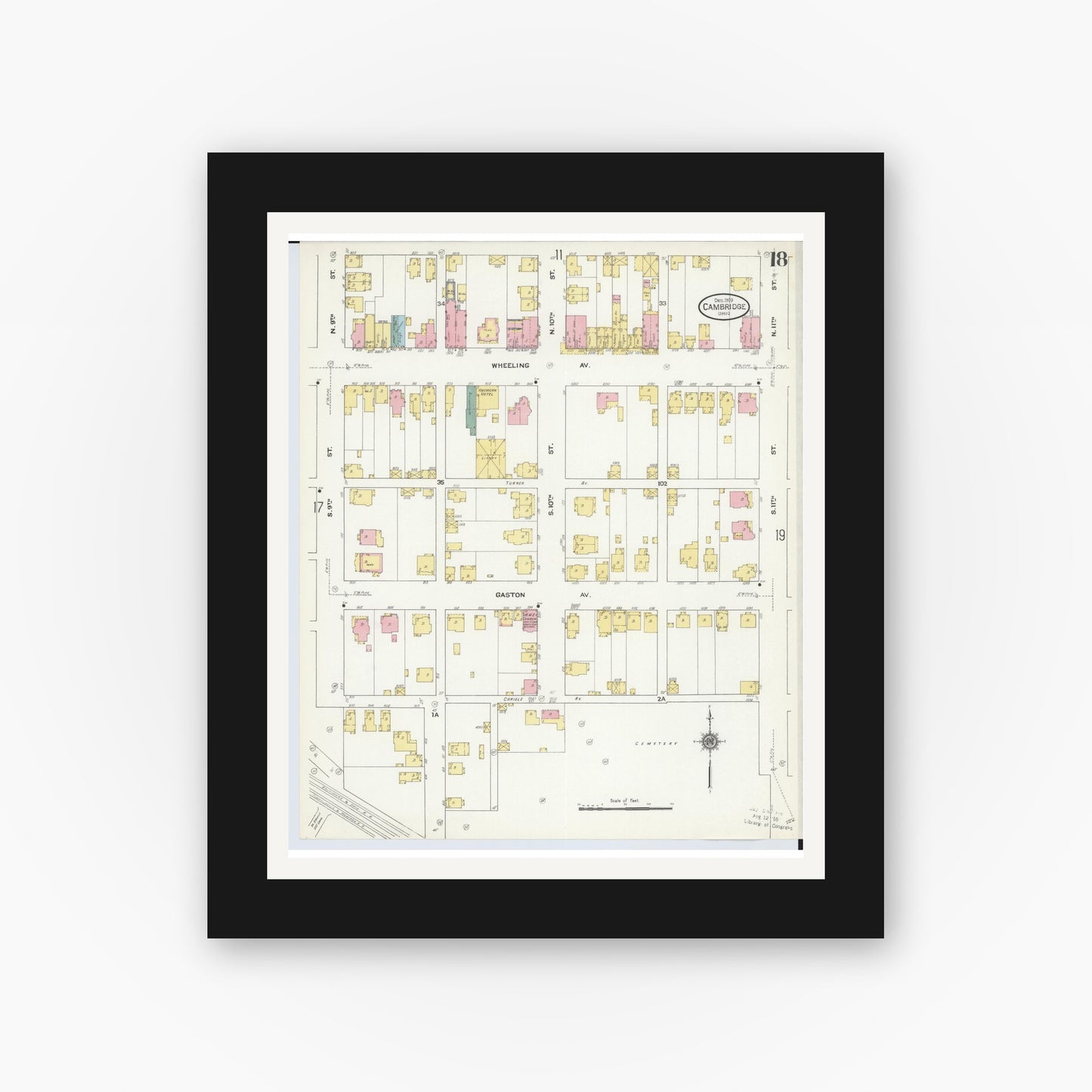 Old map wall art mockup — black gallery frame with white mat — Sanborn Fire Insurance Map from Cambridge, Guernsey County, Ohio (1909), Sheet #0018