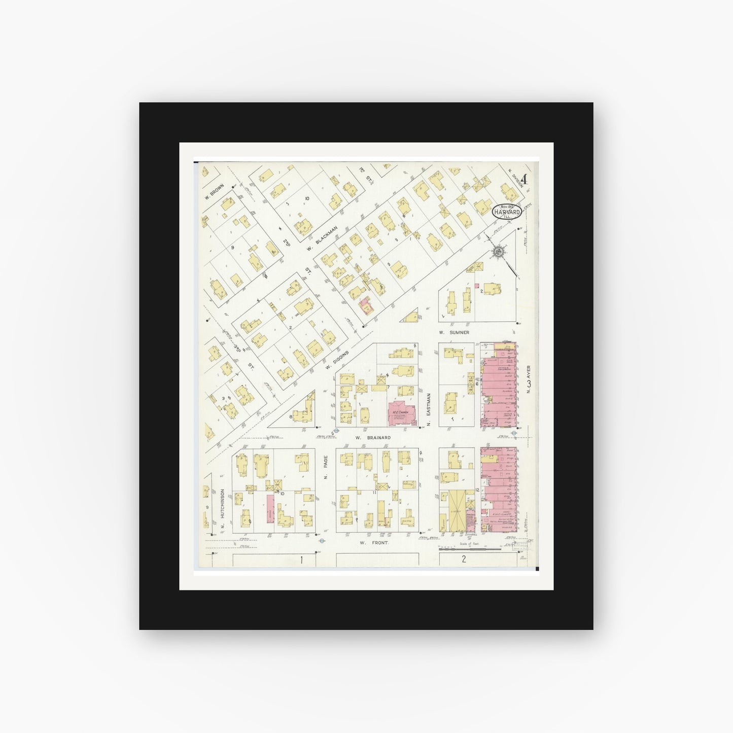 Old map wall art mockup — black gallery frame with white mat — Sanborn Fire Insurance Map from Harvard, McHenry County, Illinois (1912), Sheet #0004