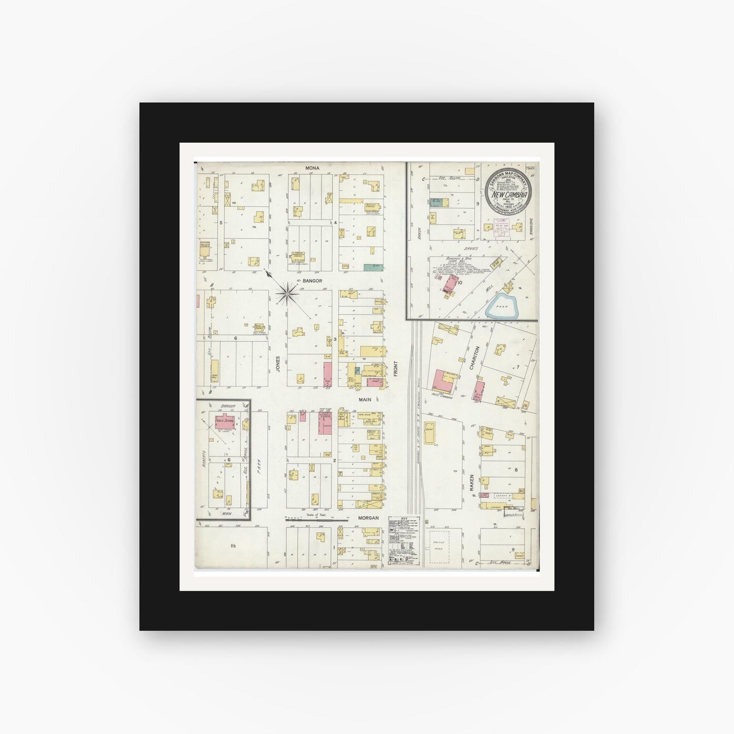 Old map wall art mockup — black gallery frame with white mat — Sanborn Fire Insurance Map from New Cambria, Macon County, Missouri (1892), Sheet #0001