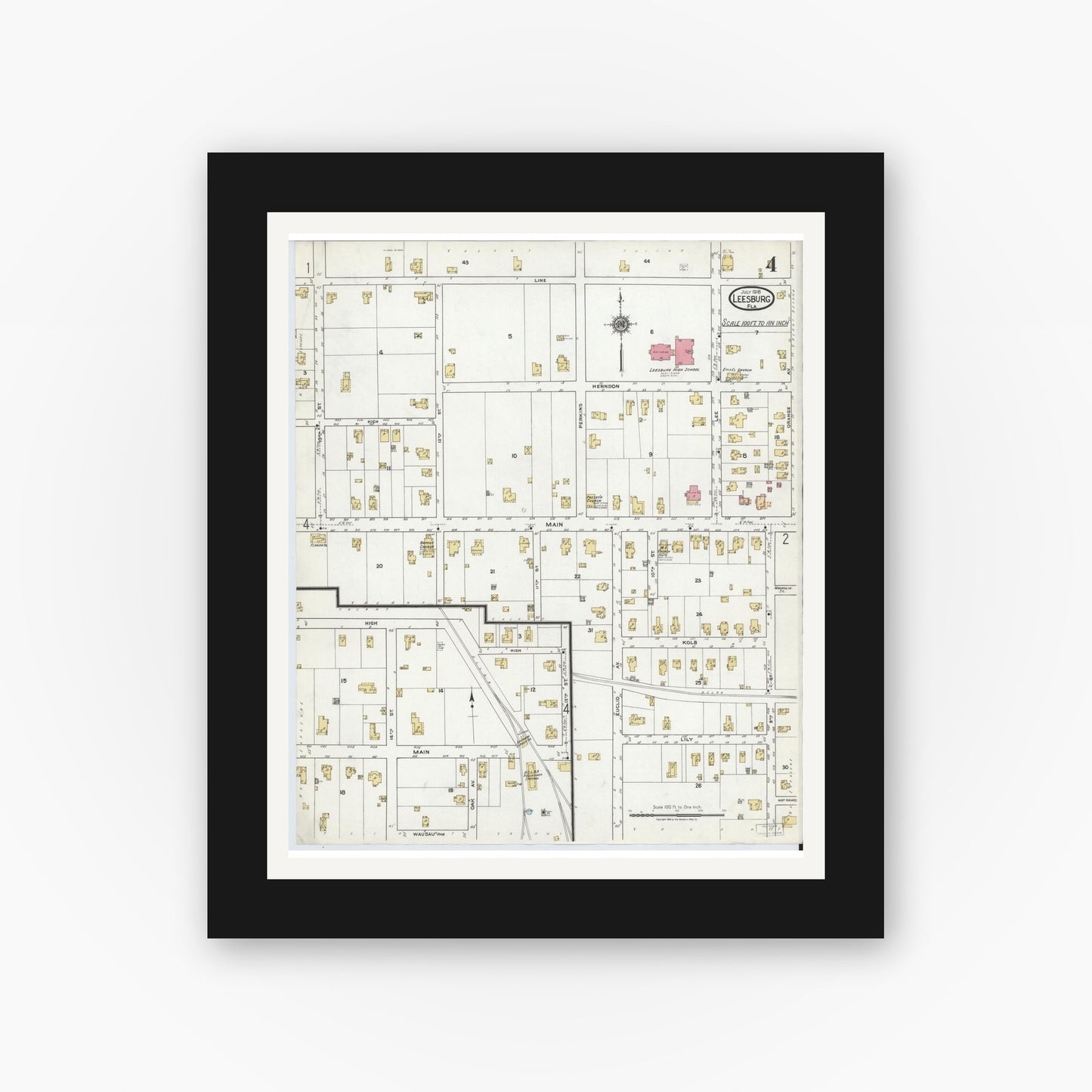 Old map wall art mockup — black gallery frame with white mat — Sanborn Fire Insurance Map from Leesburg, Lake County, Florida (1918), Sheet #0004