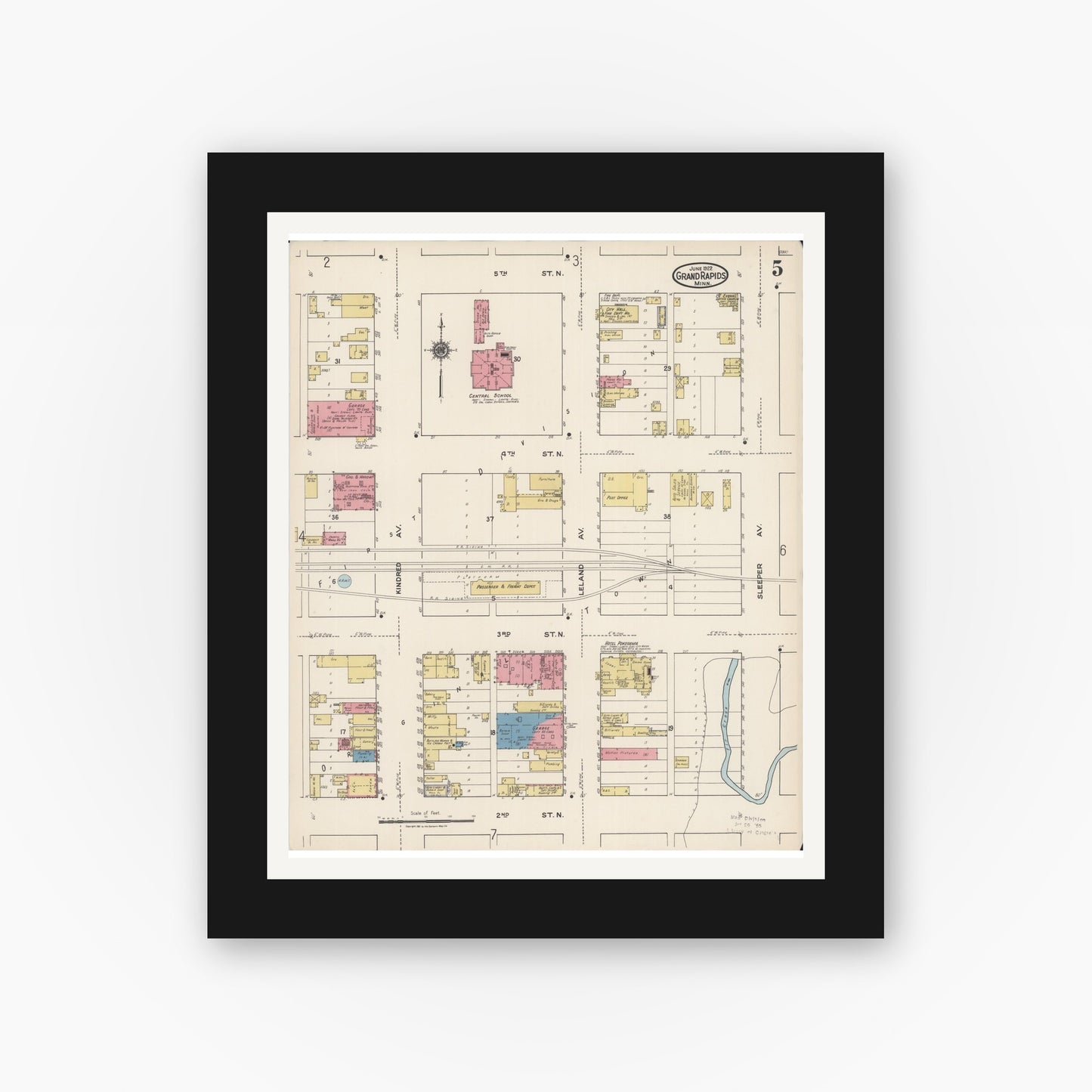 Old map wall art mockup — black gallery frame with white mat — Sanborn Fire Insurance Map from Grand Rapids, Itasca County, Minnesota (1922), Sheet #0005