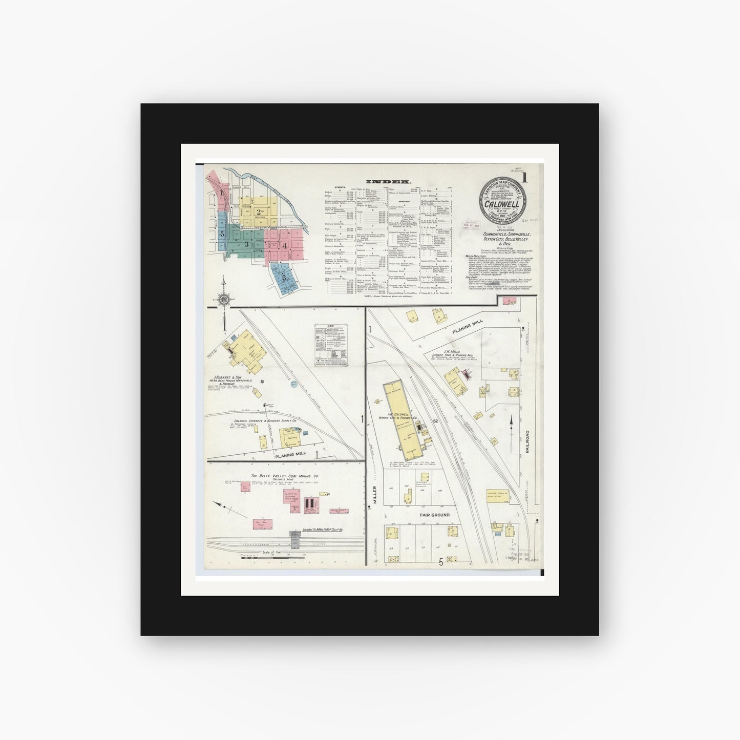 Old map wall art mockup — black gallery frame with white mat — Sanborn Fire Insurance Map from Caldwell, Noble County, Ohio (1911), Sheet #0001