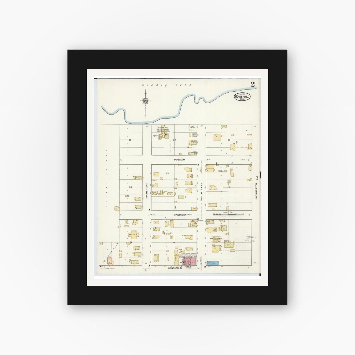 Old map wall art mockup — black gallery frame with white mat — Sanborn Fire Insurance Map from Wakefield, Gogebic County, Michigan (1917), Sheet #0002
