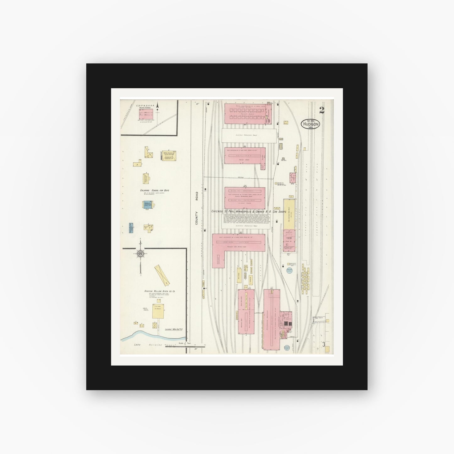Old map wall art mockup — black gallery frame with white mat — Sanborn Fire Insurance Map from Hudson, St. Croix County, Wisconsin (1912), Sheet #0002