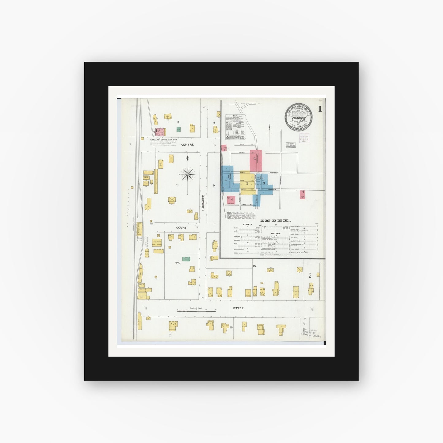 Old map wall art mockup — black gallery frame with white mat — Sanborn Fire Insurance Map from Chardon, Geauga County, Ohio (1904), Sheet #0001