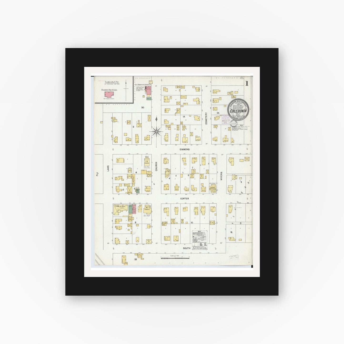 Old map wall art mockup — black gallery frame with white mat — Sanborn Fire Insurance Map from Caledonia, Kent County, Michigan (1902), Sheet #0001