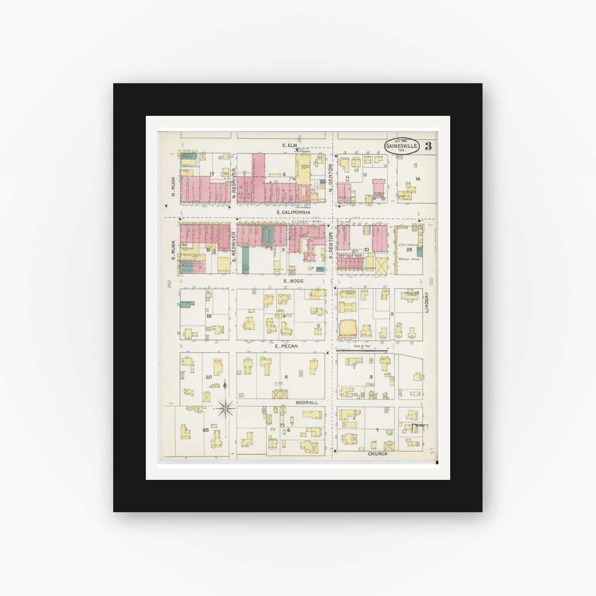 Old map wall art mockup — black gallery frame with white mat — Sanborn Fire Insurance Map from Gainesville, Cooke County, Texas (1892), Sheet #0003