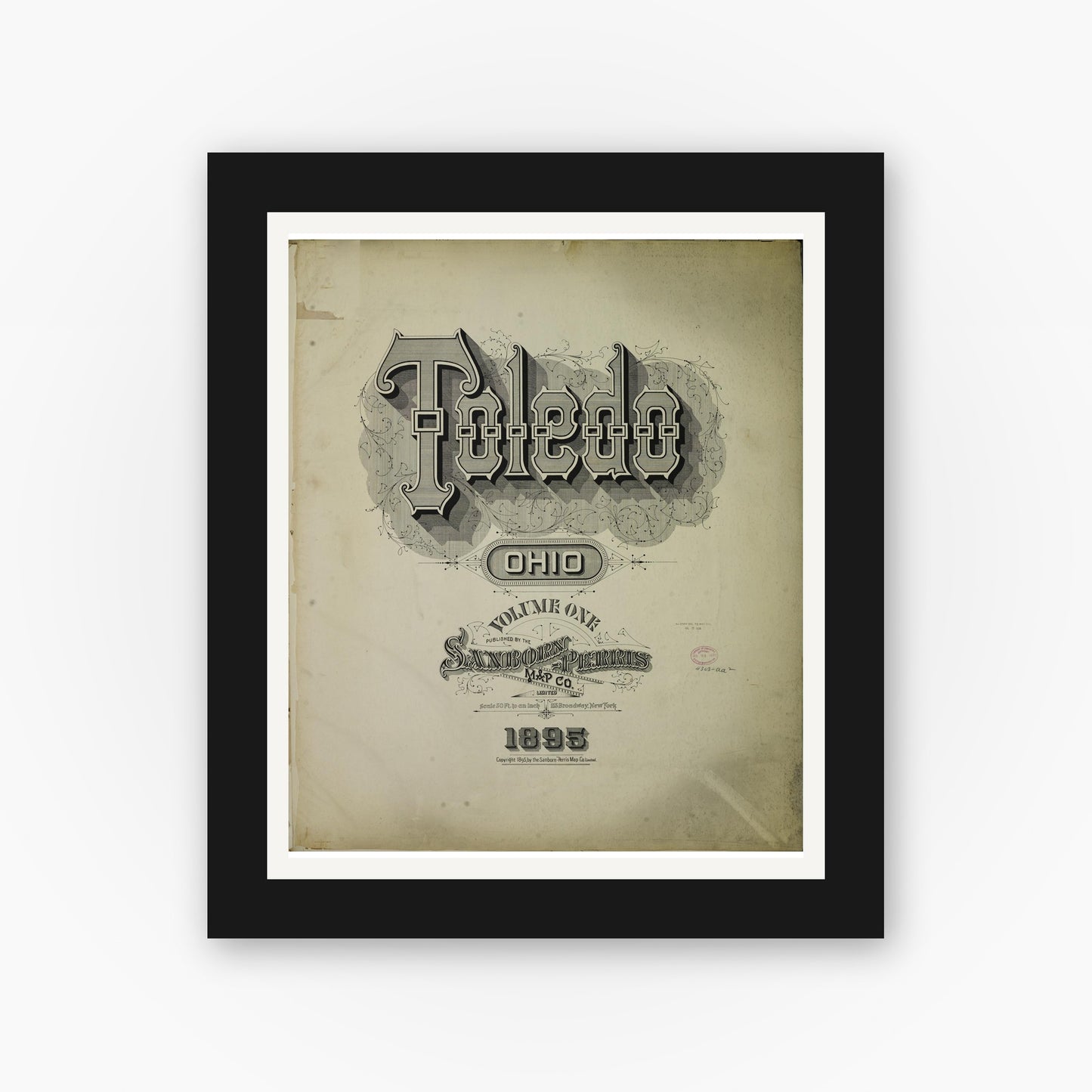 Old map wall art mockup — black gallery frame with white mat — Sanborn Fire Insurance Map from Toledo, Lucas County, Ohio (1895), Sheet #0001