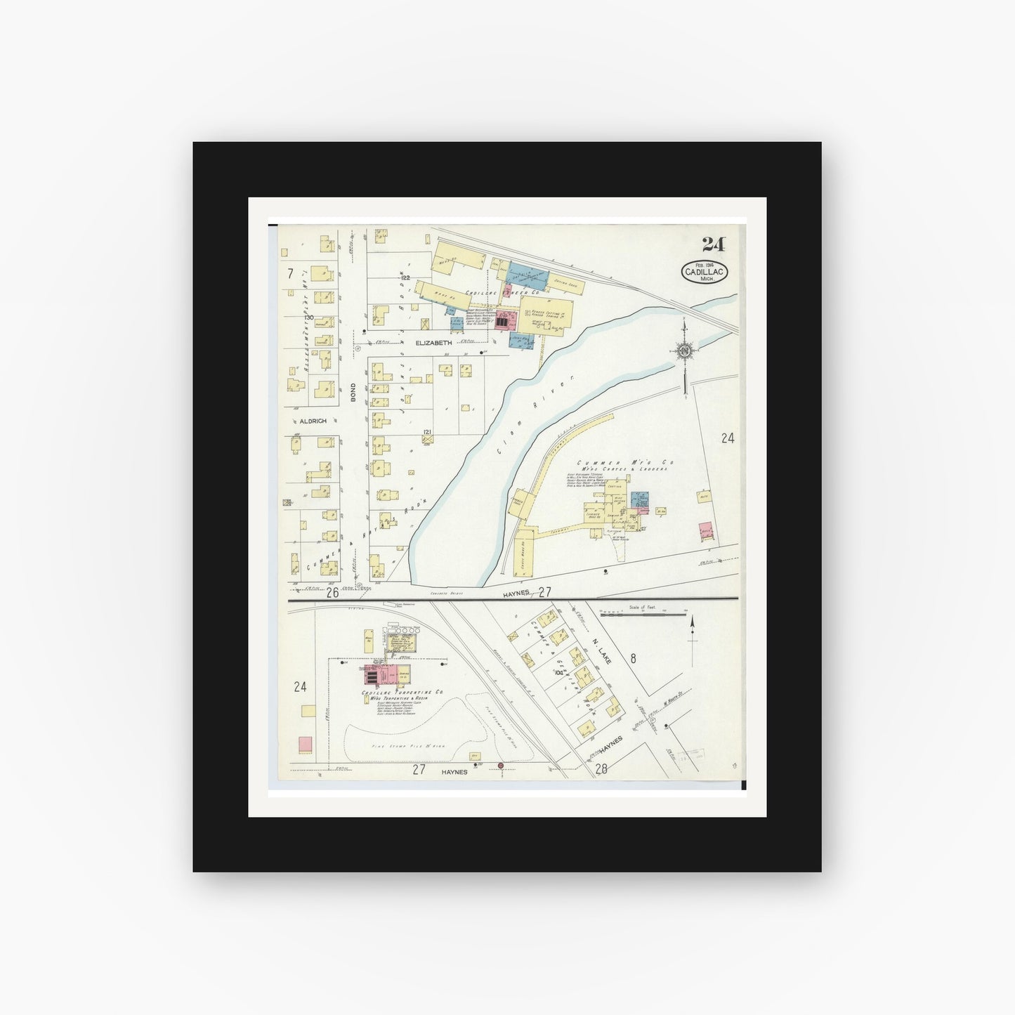 Old map wall art mockup — black gallery frame with white mat — Sanborn Fire Insurance Map from Cadillac, Wexford County, Michigan (1914), Sheet #0024