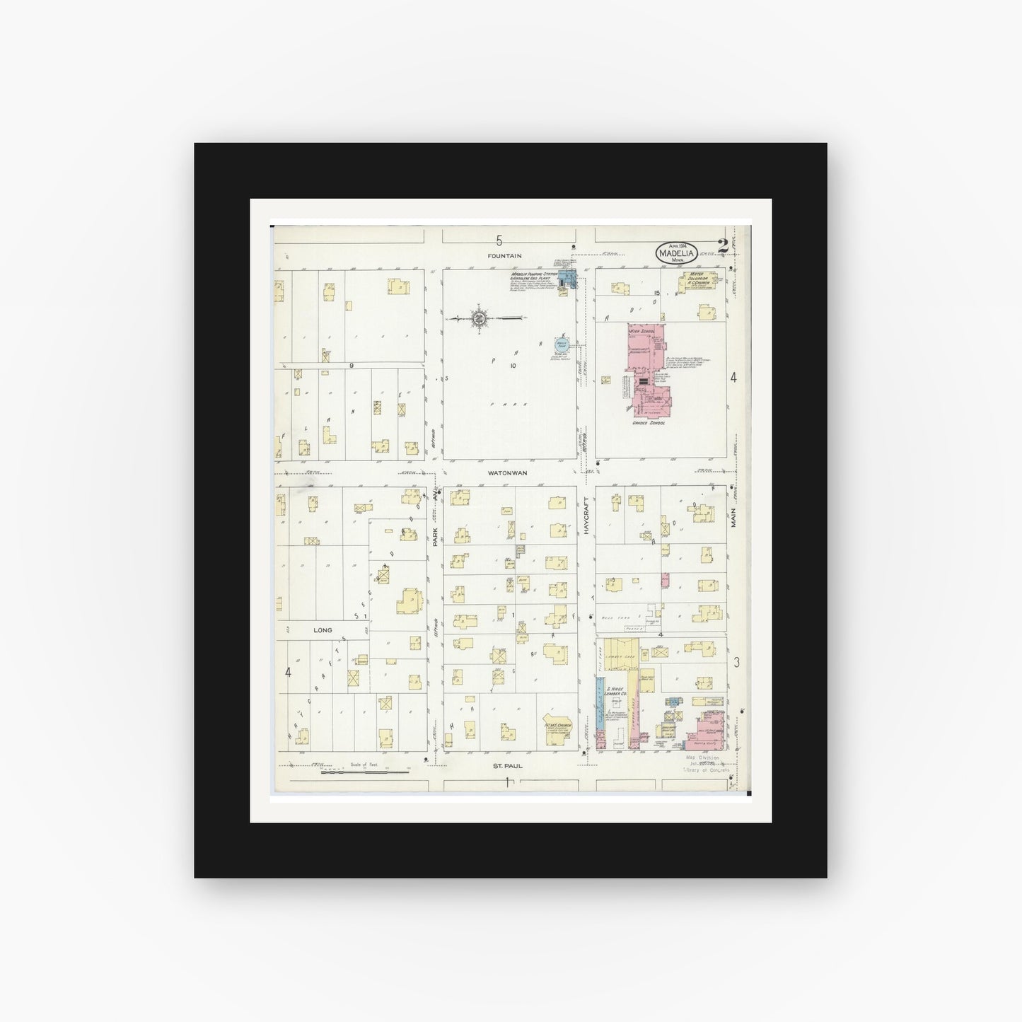 Old map wall art mockup — black gallery frame with white mat — Sanborn Fire Insurance Map from Madelia, Watonwan County, Minnesota (1914), Sheet #0002