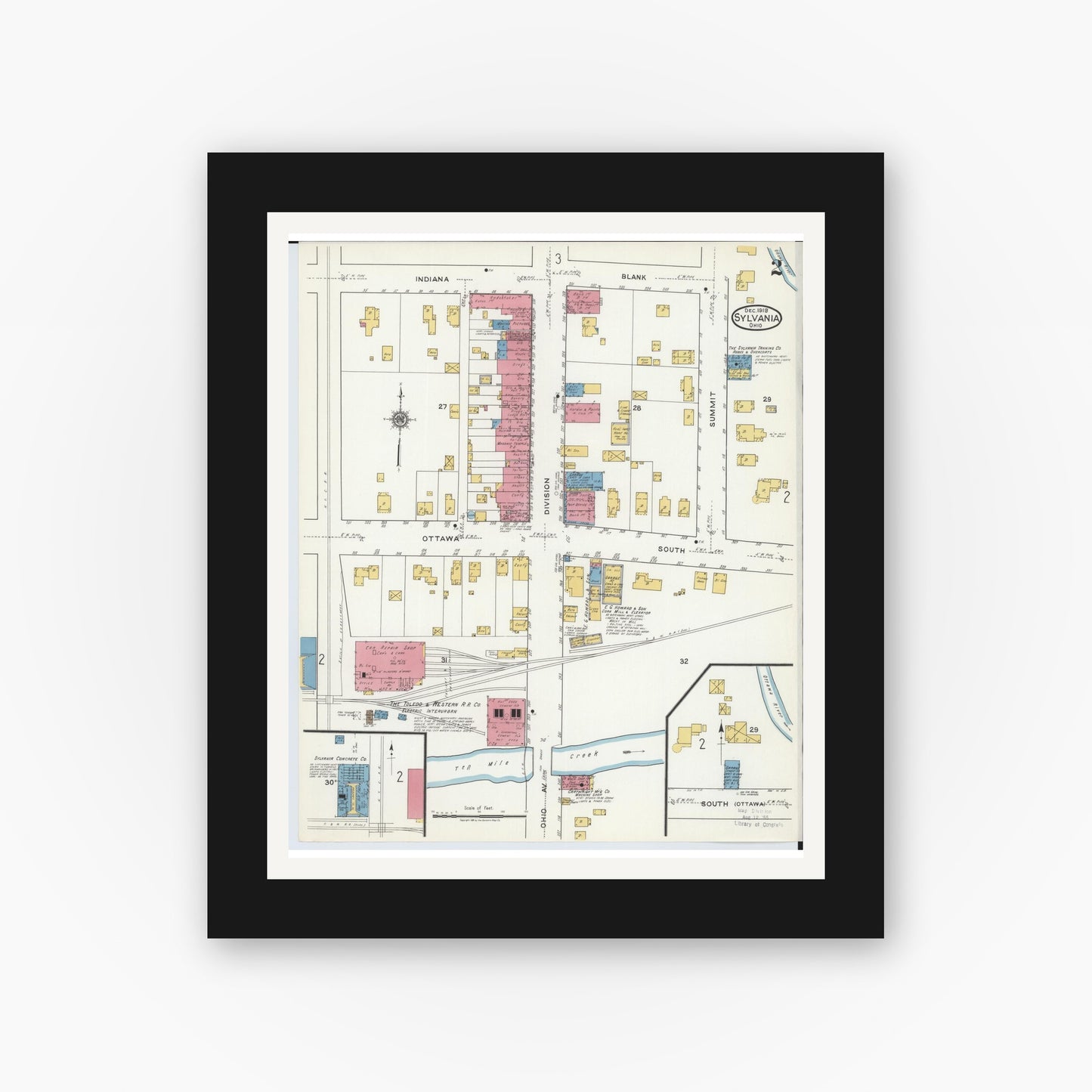 Old map wall art mockup — black gallery frame with white mat — Sanborn Fire Insurance Map from Sylvania, Lucas County, Ohio (1919), Sheet #0002