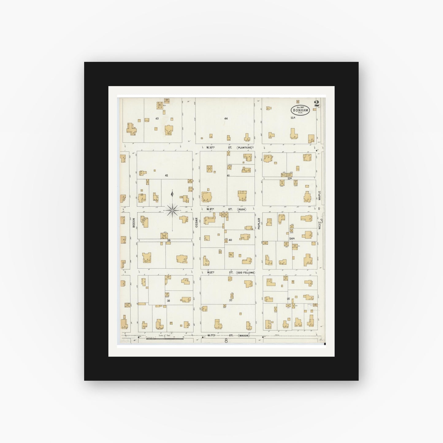 Old map wall art mockup — black gallery frame with white mat — Sanborn Fire Insurance Map from Bonham, Fannin County, Texas (1897), Sheet #0002