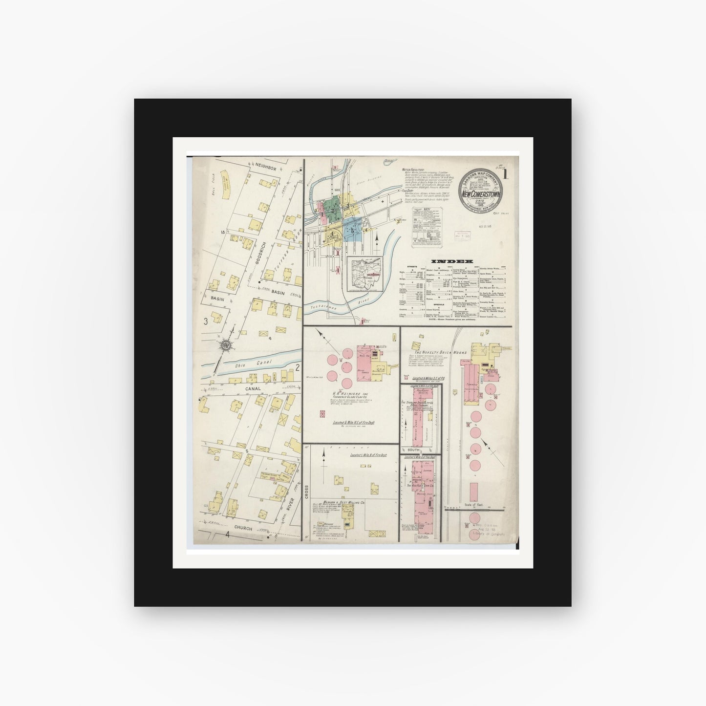 Old map wall art mockup — black gallery frame with white mat — Sanborn Fire Insurance Map from Newcomerstown, Tuscarawas County, Ohio (1915), Sheet #0001