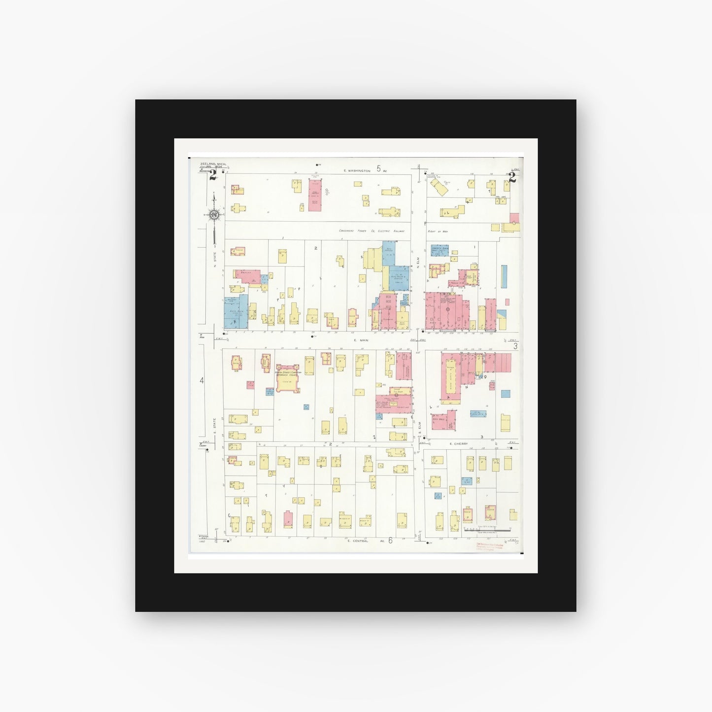 Old map wall art mockup — black gallery frame with white mat — Sanborn Fire Insurance Map from Zeeland, Ottawa County, Michigan (1934), Sheet #0002