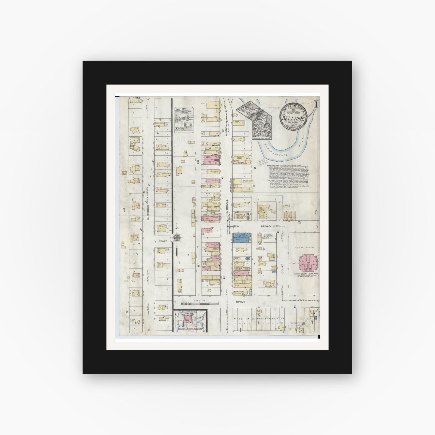 Old map wall art mockup — black gallery frame with white mat — Sanborn Fire Insurance Map from Bellaire, Antrim County, Michigan (1920), Sheet #0001