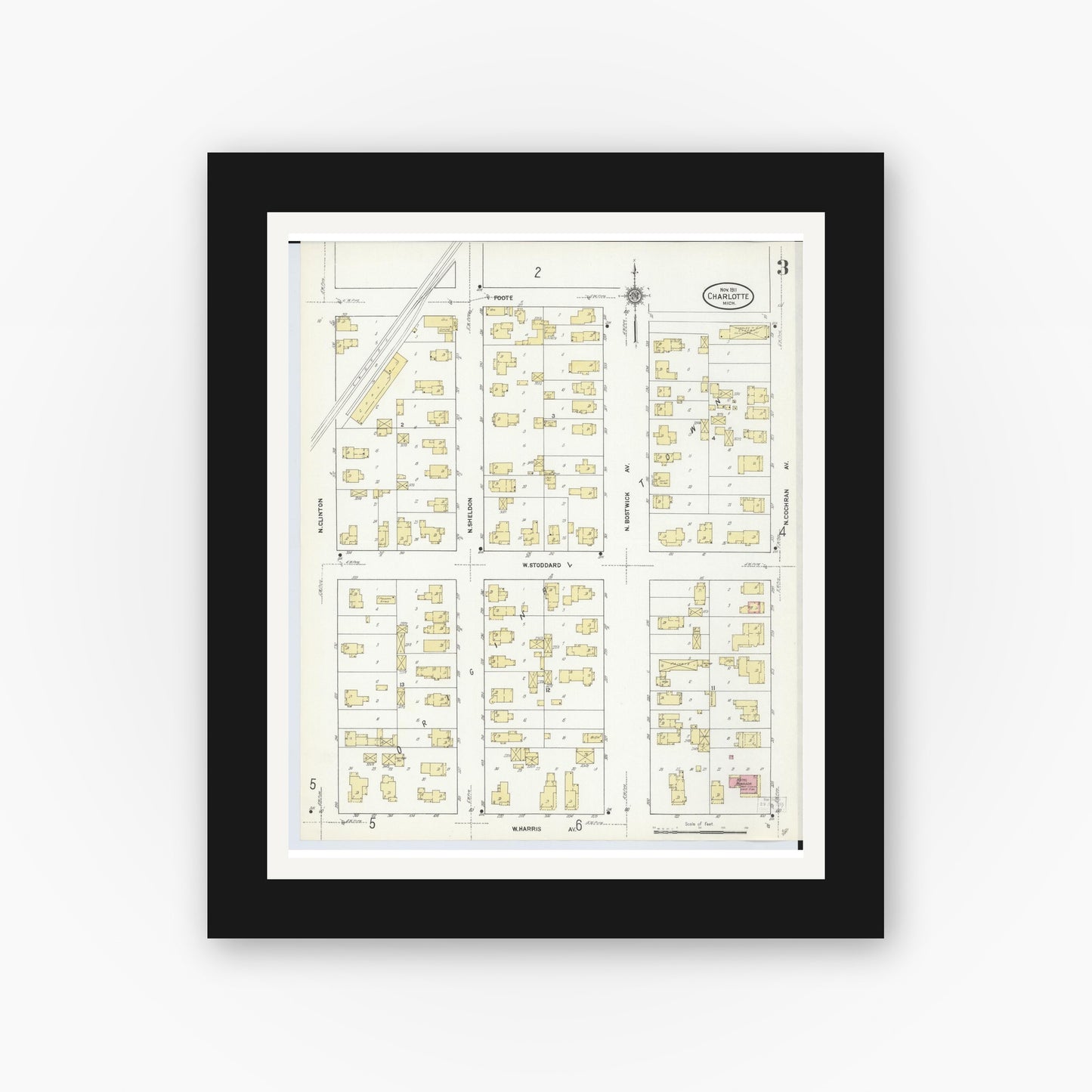 Old map wall art mockup — black gallery frame with white mat — Sanborn Fire Insurance Map from Charlotte, Eaton County, Michigan (1911), Sheet #0003