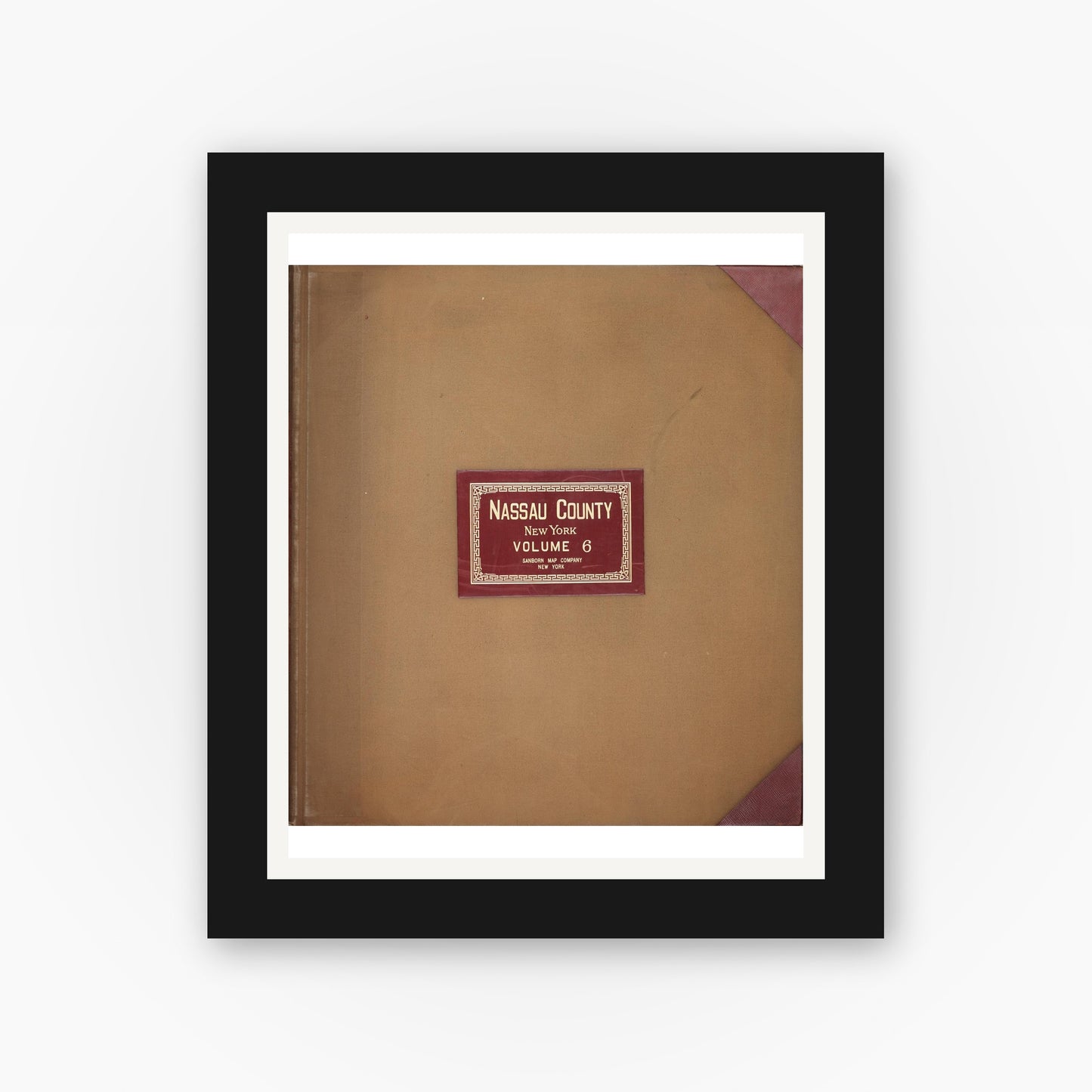 Old map wall art mockup — black gallery frame with white mat — Sanborn Fire Insurance Map from Nassau, Nassau County, New York (1951), Sheet #0001
