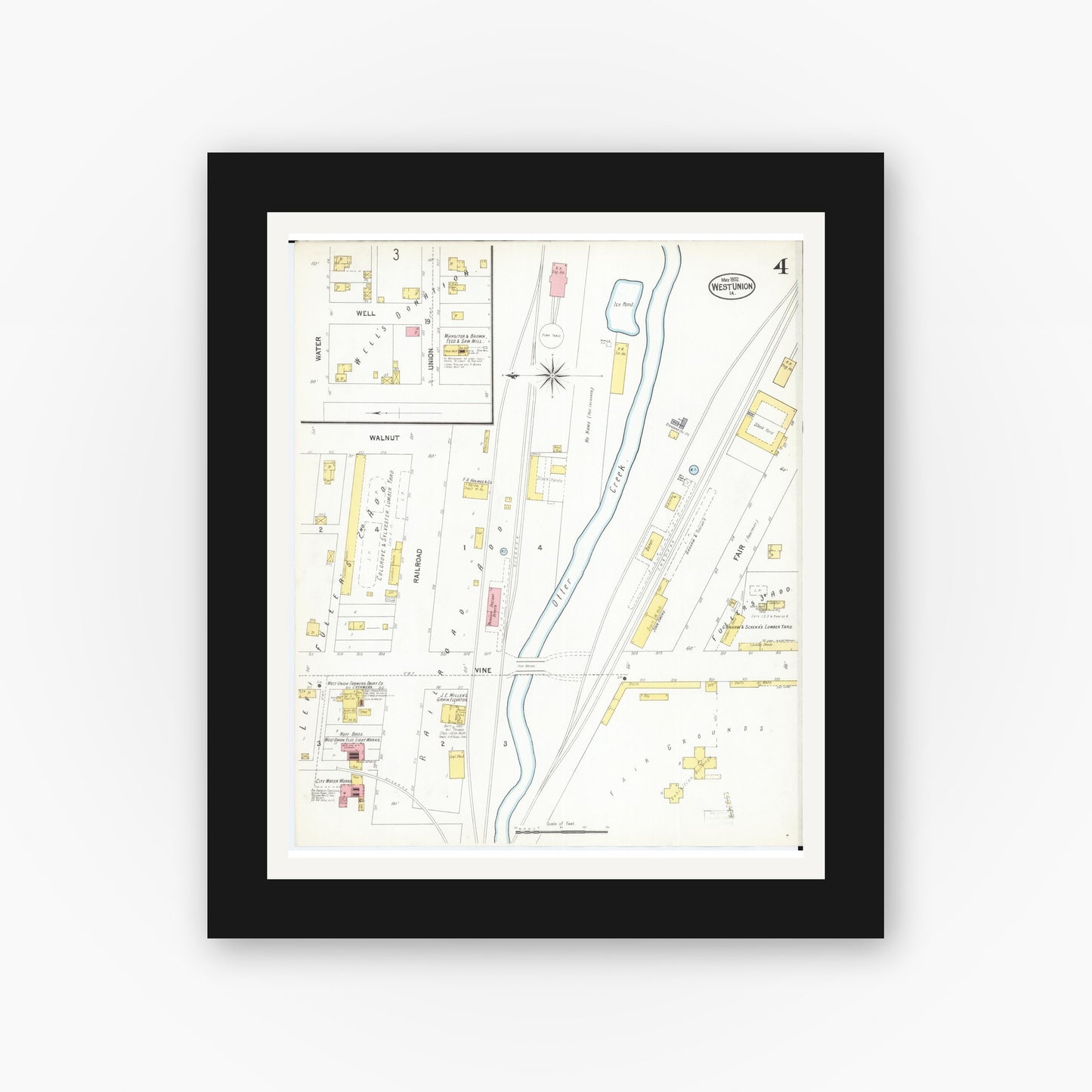 Old map wall art mockup — black gallery frame with white mat — Sanborn Fire Insurance Map from West Union, Fayette County, Iowa (1902), Sheet #0004
