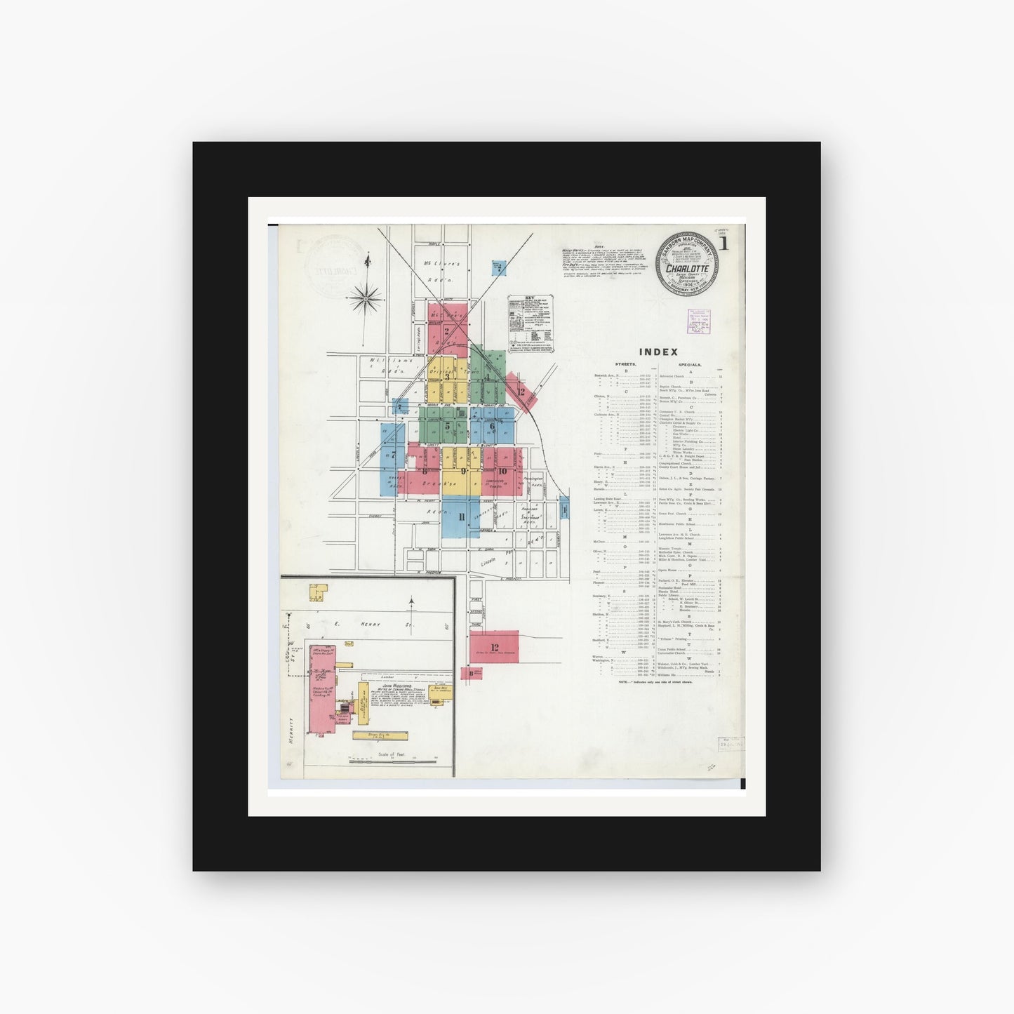 Old map wall art mockup — black gallery frame with white mat — Sanborn Fire Insurance Map from Charlotte, Eaton County, Michigan (1904), Sheet #0001