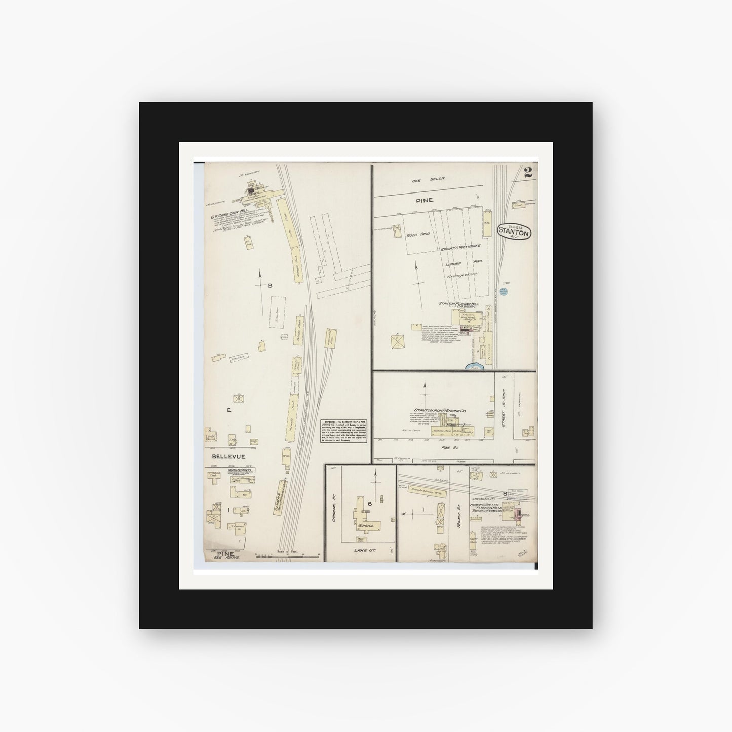 Old map wall art mockup — black gallery frame with white mat — Sanborn Fire Insurance Map from Stanton, Montcalm County, Michigan (1884), Sheet #0002