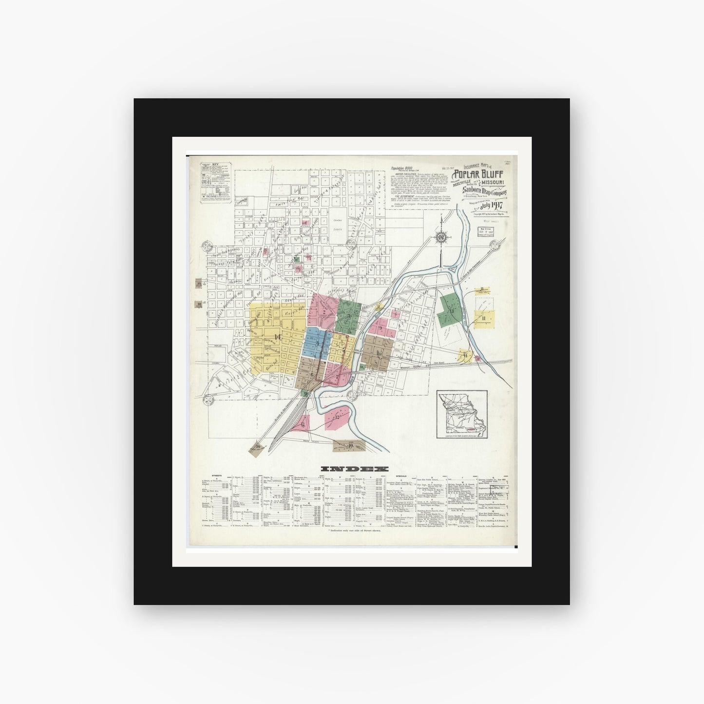 Old map wall art mockup — black gallery frame with white mat — Sanborn Fire Insurance Map from Poplar Bluff, Butler County, Missouri (1917) - Complete Map Set