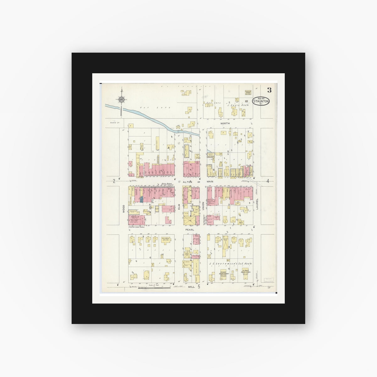 Old map wall art mockup — black gallery frame with white mat — Sanborn Fire Insurance Map from Staunton, Macoupin County, Illinois (1913), Sheet #0003